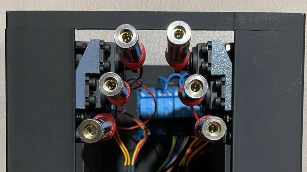 Close view of the ALDA device showing six laser modules, wiring and its black frame.
